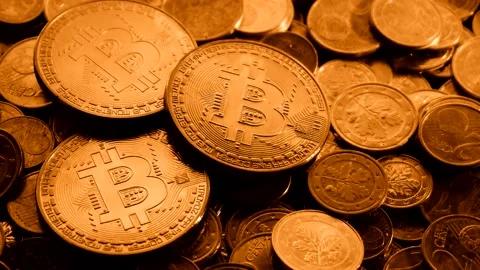A footage of bitcoins in the reflection of the flame Stock Footage 149036204