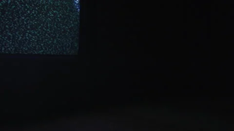 Footage of Bottom Right Corner of Flickering Static Tv in Dark Empty Room Stock Footage 208787612