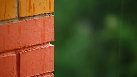 Footage of brick wall rain Stock Footage 156544714