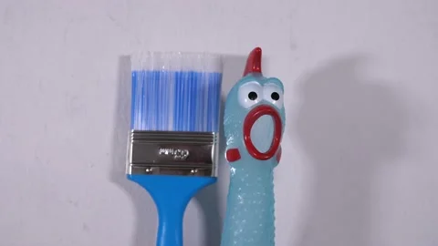 Footage of brush rubber chicken sharp wall Stock Footage 171159992