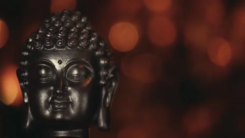 Footage of buddha head dark background Stock Footage 149304134