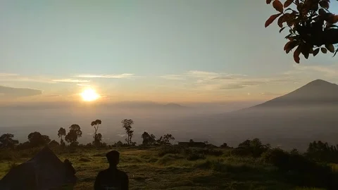 Footage captures the atmosphere of the sun setting in the morning Stock Footage 307620037