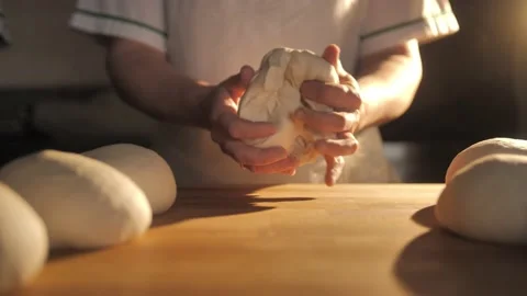 Footage of chef making dough for donuts or pizza. Stock Footage 168534039