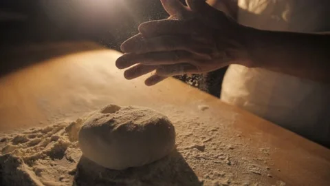 Footage of chef making dough for donuts or pizza. Stock Footage 168534627