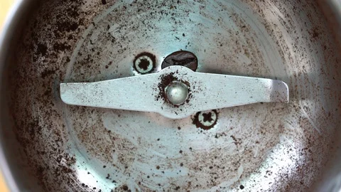 Footage of close-up coffee beans poured into coffee grinder Stock Footage 122930268