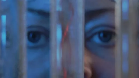 Footage computer graphics and video. Three test tubes in one of which rotate red Stock Footage 233029572