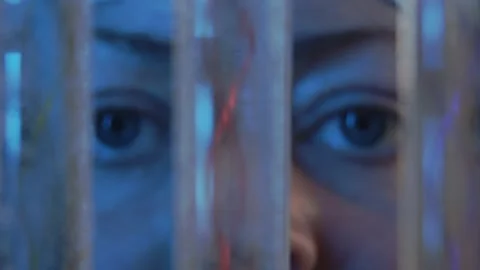 Footage computer graphics and video. Three test tubes in which DNA chains of dif Stock Footage 233029634