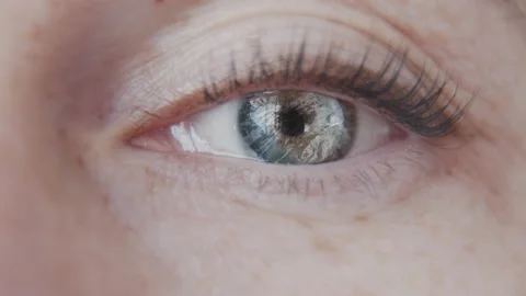 Footage computer graphics and video. Double exposure. The eye of a woman in whic Stock Footage 233029849