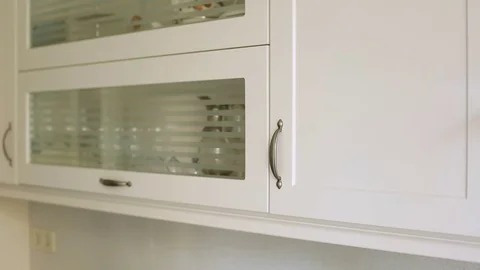 Footage of cupboards and built in modules in kitchen,Interior shot Stock Footage 76748131