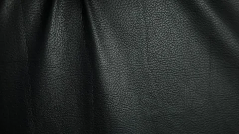 Footage of dark leather background Stock Footage 240470565