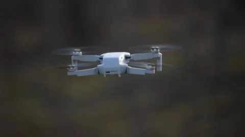 Footage from a Dji Mini 2 hovering slow motion back side Video stock 229542763