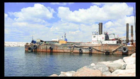 Footage of dockbound piling ship in the harbor Stock Footage 299241894