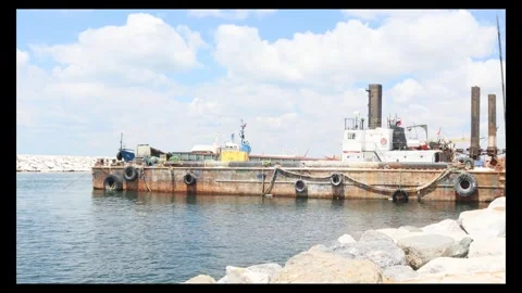 Footage of dockbound piling ship in the harbor Stock Footage 299241904