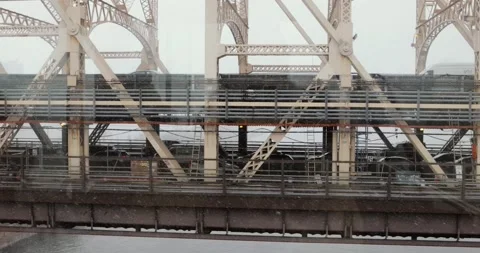 Footage from a down moving tram on a winter day near the bridge in New York Stockbeeldmateriaal 237016573