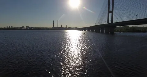 Footage from drone moving back close-up to the water. . Beautiful riverscape of Stock Footage 82657418