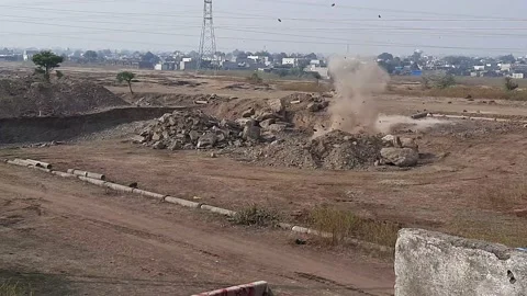 Footage of dynamite blasting at the construction site to break rock - Stock Footage 168050923