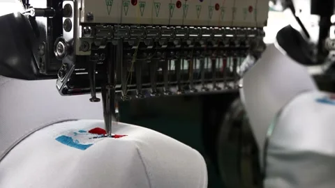 Footage of Embroidery caps in progress by Computerized machine embroidery Video stock 139962205