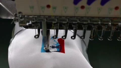Footage of Embroidery caps in progress by Computerized machine embroidery Video stock 139962216