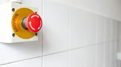 Footage of an emergency button and a man hitting it and runs away Stock Footage 55325780