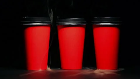 Footage of empty cup smoke dark background Stock Footage 139462140