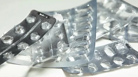 Footage of empty pills pack white background Stock Footage 287196812