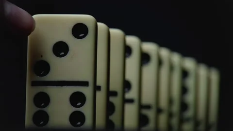 Footage of falling domino elements - domino effect Stock Footage 153857936