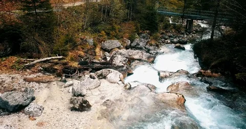 Footage fly over mountain stream waterfalls in the forest Stock Footage 110762774