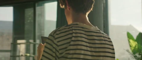 Footage of focused young redhead man holding digital tablet and searching app Stock-Footage 314557668