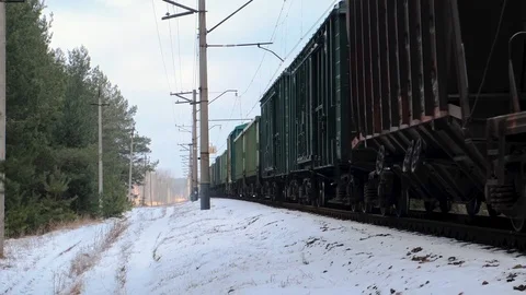 Footage of freight train on rails in winter forest Video stock 125478465