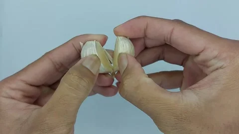 Footage of garlic with white background Stock Footage 245594139