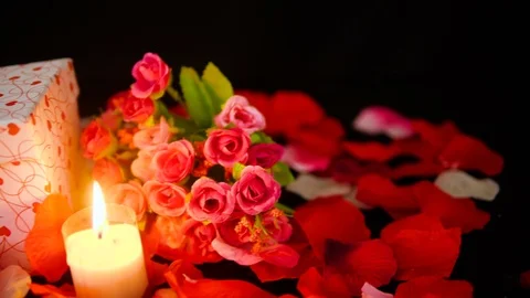 Footage of gift boxes, candle burning and flower for Valentine day Stock Footage 101222735