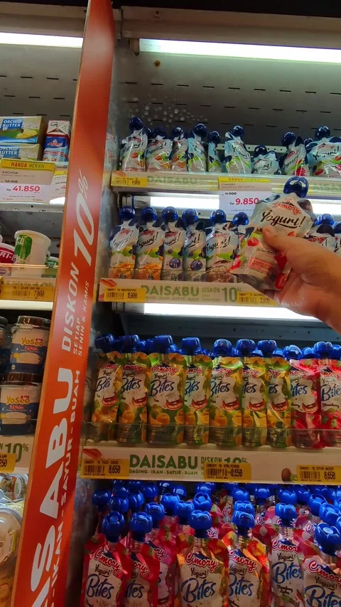 Footage of hands selecting and considering bottled drinks Stock Footage 318954262