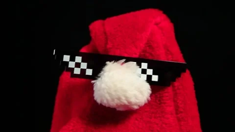 Footage of hat glasses dark background Stock Footage 223697592