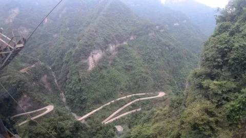Footage from inside cabin cable car with the Green forest  Stock Footage 119093213