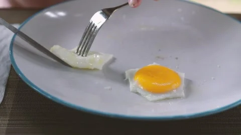 Footage lady hand slice an egg  Stock Footage 267388695