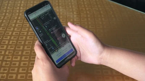  Footage of lady hand using Grab apps to call grab car Stock-Footage 114174085
