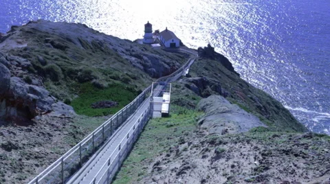 Footage looking down the long stairway to the lighthouse at Point Reyes Stock Footage 47329357