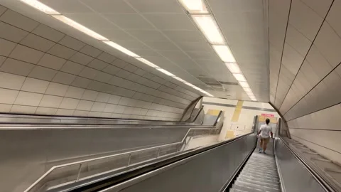 Footage of man using escalator in subway station in Istanbul, Turkey. Stock Footage 239348987