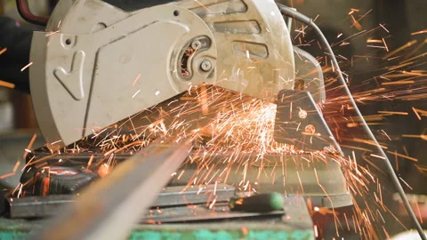 Footage of a man work with grinding a sheet of metal. Close-up Stock Footage 153789838