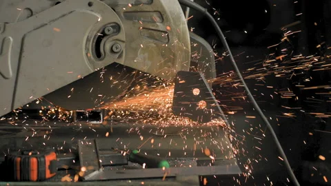 Footage of a man work with grinding a sheet of metal. Close-up Stock Footage 153790049