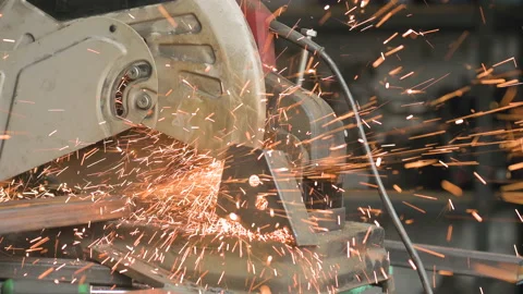 Footage of a man work with grinding a sheet of metal. Close-up Stock Footage 153790337