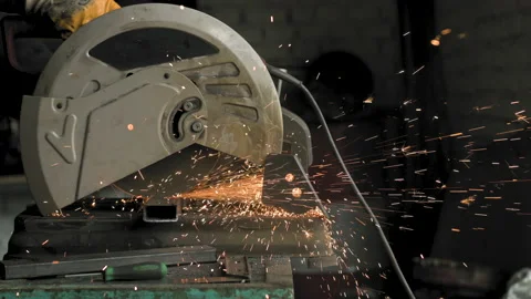Footage of a man work with grinding a sheet of metal. Close-up Stock Footage 153790464