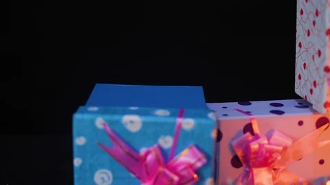Footage of move gift boxes with candle burning and ornament christmas Stock Footage 100246387