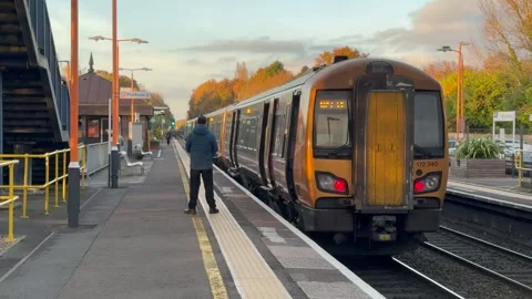 Footage of a Network Rail passenger commuter train Stock Footage 292374976