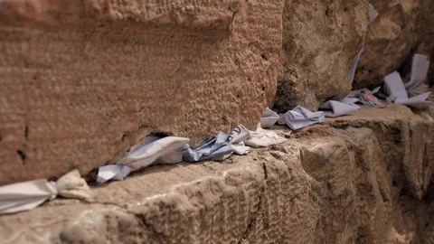 Footage of notes in the cracks of Western Wall (Kotel) Jerusalem. Israel Video stock 126049334