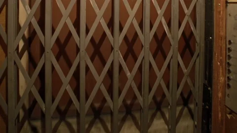 Footage of an Old Communist Elevator Lift Running From Floor to Floor in Stock Footage 166487666