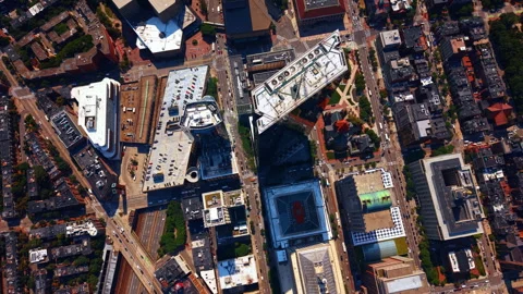 Footage over the rooftops of the buildings of diverse height. Flight above the Stock Footage 344043841