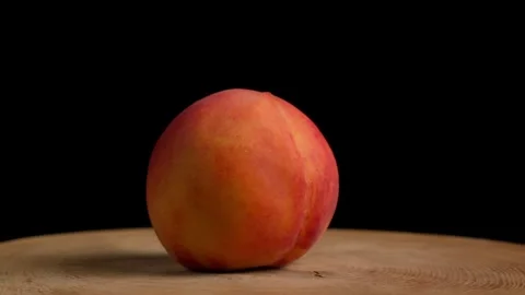 Footage of a Peach Rotating Stock Footage 284283122