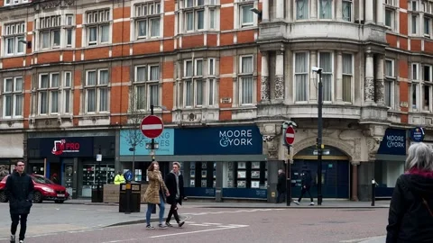 A footage of pedestrians crossing the intersection Видео 236008600