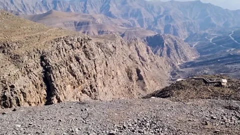Footage of the person using zip line in the mountainous area. Activities Stock Footage 240890541